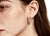 Elegant 18K pink rose gold French clip earrings featuring bezel-set multi-color diamonds totaling 1.5 carats. Estate...