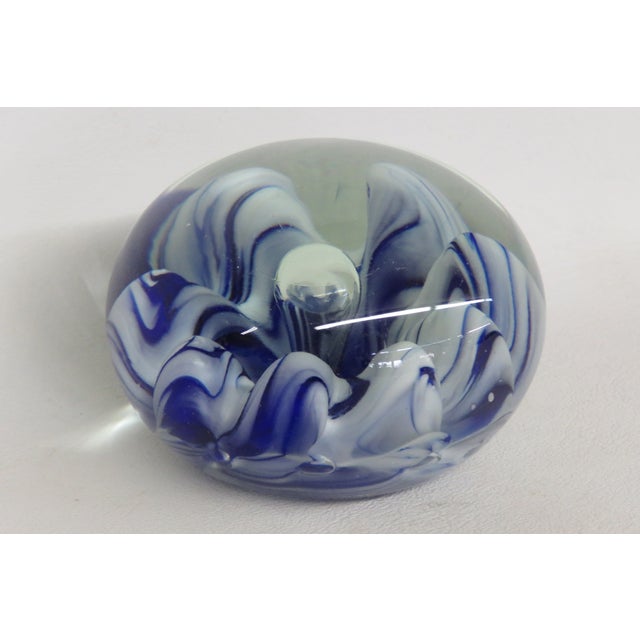This stunning Art Glass Paperweight is made of hand blown glass. This beautiful paperweight has a classic rounded...