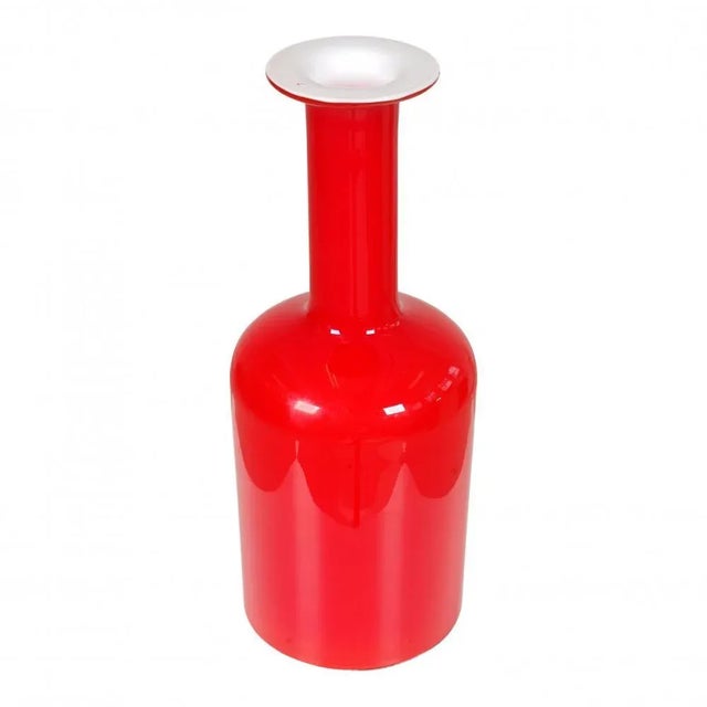 Otto Brauer/Holmegaard red glass vase. H: 31 , D: 11. No defects.