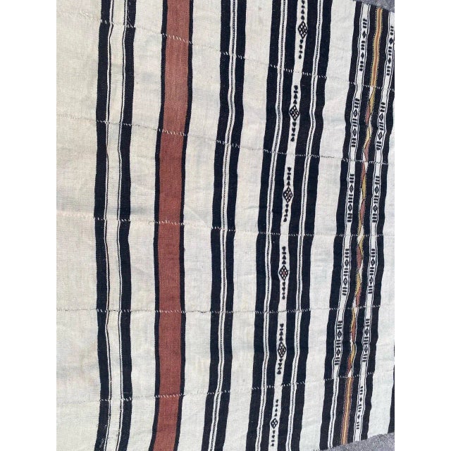 Very beautiful early 20th century long, soft Malian Kilim with a tribal geometrical design and light colors with white,...