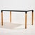 The ‘Flex 2000’ dining table from the 1980s designed by Gerd Lange for Thonet. The table has clean lines with beech legs...