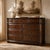 Substantial solid wood nine-drawer dresser by Arhaus, featuring an oversized scale, rich dark brown finish and beautifully...