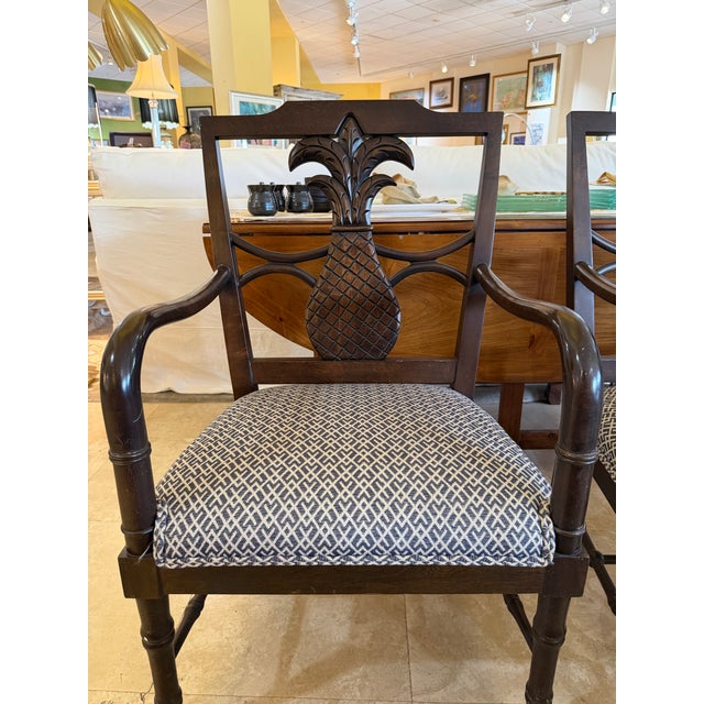 Infuse your home with a symbol of classic hospitality with this exquisite pair of Federal-style open-back armchairs...