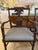 Infuse your home with a symbol of classic hospitality with this exquisite pair of Federal-style open-back armchairs...