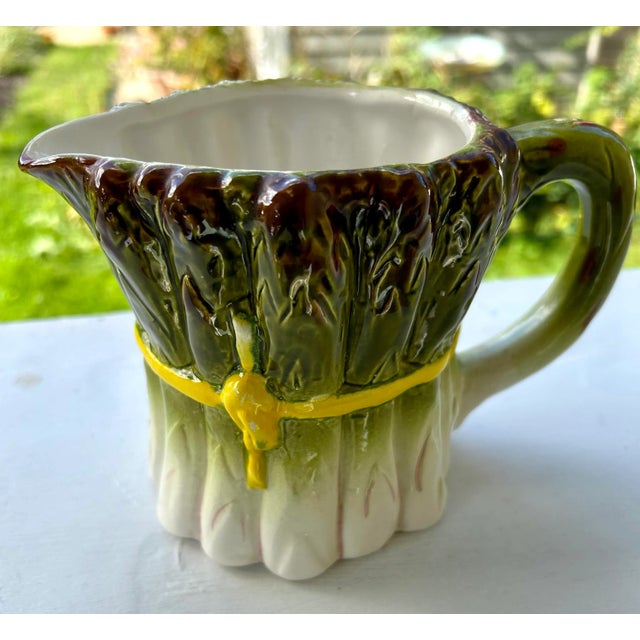 Rare Mancer Majolica pitcher from the 1950s - 1960s. Beautiful, hand painted, asparagus shaped porcelain pitcher, made in...
