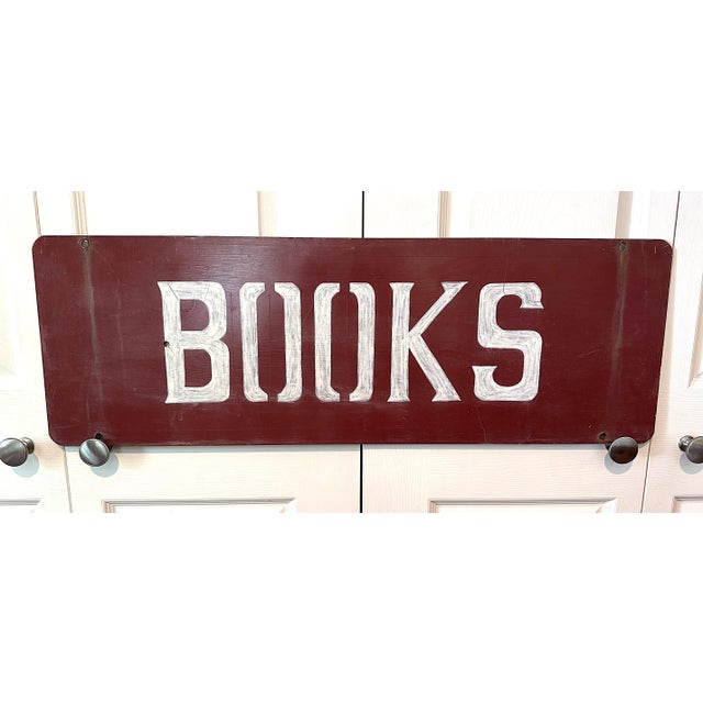 This steel maroon with white letters BOOKS sign was purchased in New Hampshire. Measures 36"x12" and weighs about 9...