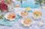 Bring a touch of coastal charm to your table with this set of four ceramic clam shell dishes, each beautifully sculpted...