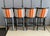 Set of four high-quality Kreiss Thames barstools with sturdy dark wood frames and bold striped upholstery. Comfortable...