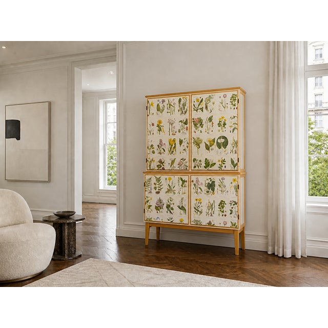 Swedish mid century cabinet by Lamhults Möbler covered with illustrations from Nordens Flora by C.A.M Lindman. The same...
