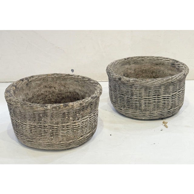 A fine English garden urn (or planter pot) of composition stone, featuring a decorative basket weave style design with...