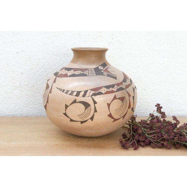 This spectacular vessel is a profound tribute to the ancient artistry of Northern Mexico, hailing from the rugged...