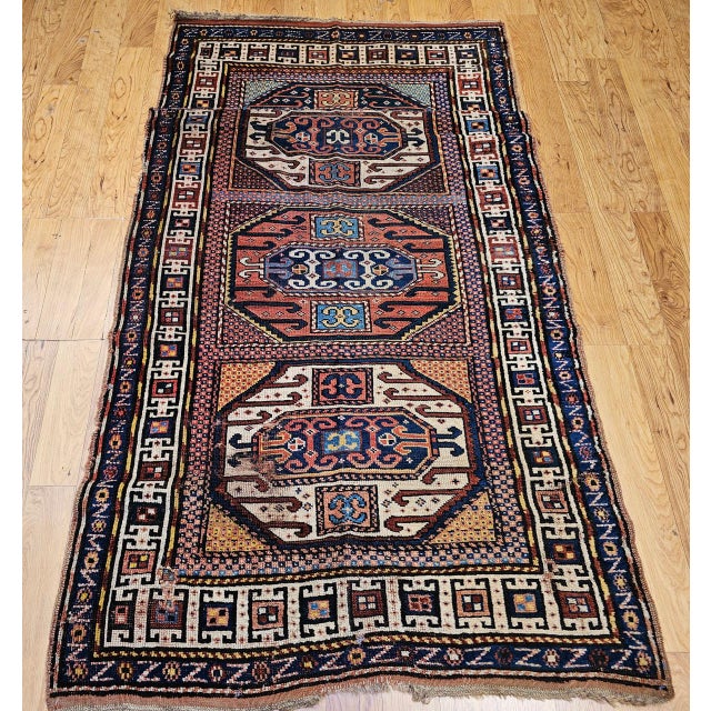Antique Karachov Kazak area rug, meticulously hand-knotted in the fourth quarter of the 1800s. Originating from the rugged...