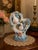 Exceptional vintage Capodimonte-style porcelain figural centerpiece featuring two graceful white doves perched within an...