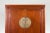 Chinese Qing Dynasty Armoire with Brass Medallion and Reconfigured Pocket Doors For Sale - Image 4 of 13