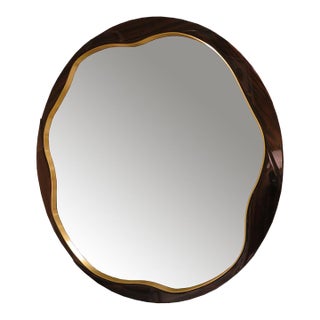 Sleek Round Mirror With Macassar Frame With Wavy Brushed Brass Details For Sale