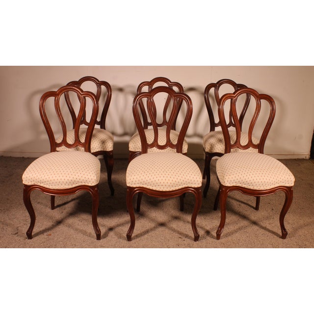 A delightful set of six Napoleon III period chairs with elegant curved backs and openwork slats. A beautiful, high-quality...