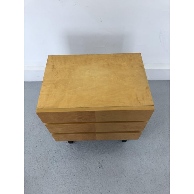 Small wooden cabinet from 1970s. It has three pull out drawers. The whole in gloss. The legs are detachable. The height of...