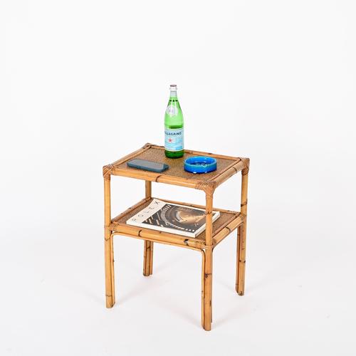 Wonderful mid-century Italian side table or nightstand in bamboo, rattan, and hand-woven wicker. This lovely organic piece...