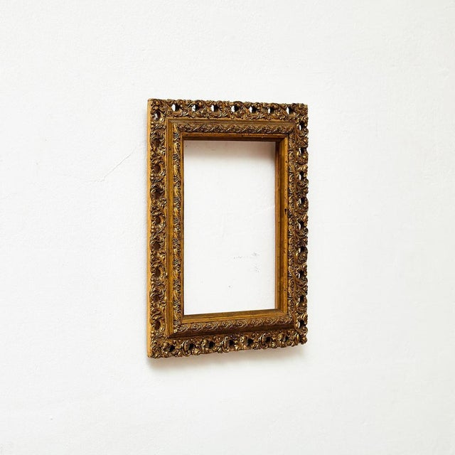 Antique Ornament Gold Wood Frame. Manufactured France, circa 1930. Materials: Wood Dimensions: D 3.5 x W 30 cm x H 35.5 cm...