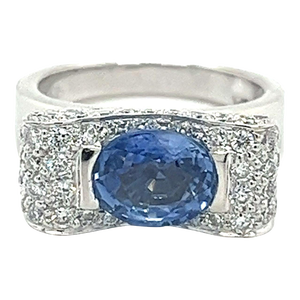 2.20 Carat Oval Cut Tanzanite Half Bezel Bow Style Ring in 18K White Gold, Size 6