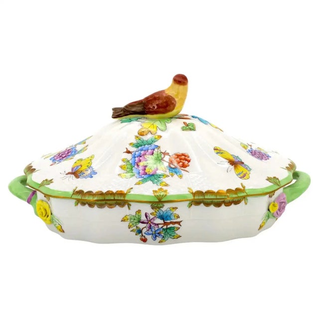 Herend "Queen Victoria" covered bowl or soup tureen with bird finial on the lid covers top. The covered bowl features...