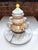 Perfect for collectors, tabletop stylists, or anyone who loves quirky heirloom ceramics. Description: A whimsical and...