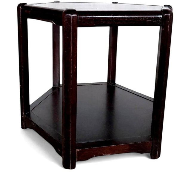 A beautifully crafted mid century Danish coffee table, featuring a distinctive hexagonal form and rich dark wood finish....