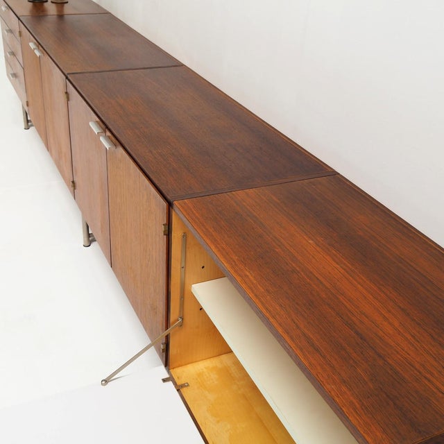 A large teak sideboard designed by cees braakman for pastoe in the 1950s. a fine example of dutch modernist design, with...