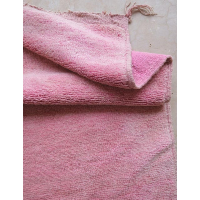 Introducing our Solid Pink Moroccan Rug, measuring 8.3 x 5 ft. This stunning rug is perfect for adding a pop of color to...