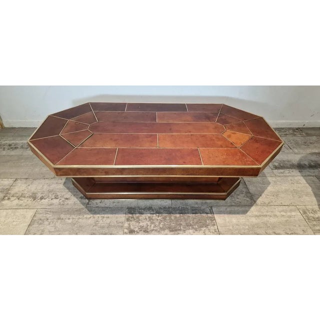Large full leather brown coffee table with brass details from France.