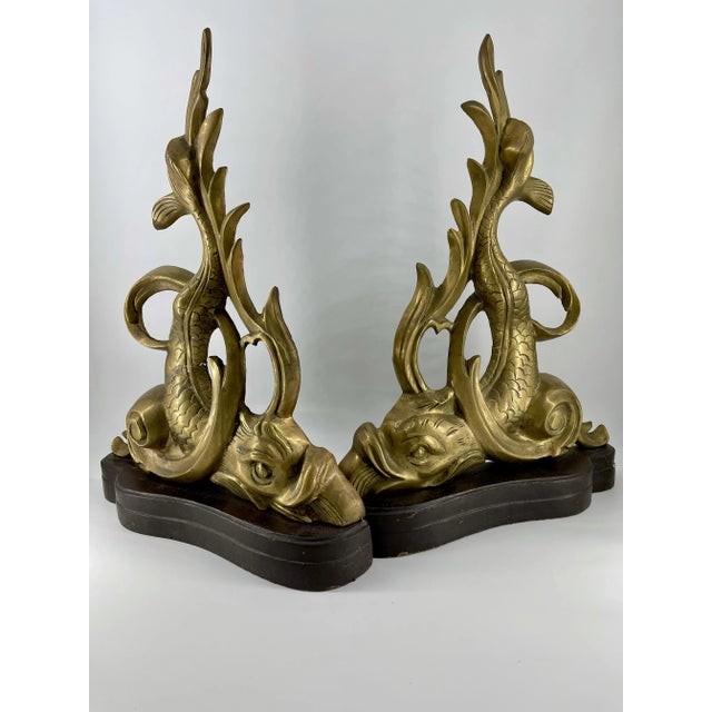 Amazing hard-to-find pair of vintage brass dolphins will add immediate style and flare to the fireplace!