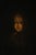 Oil on canvas, chiaroscuro portrait titled “Figure Blowing Out a Candle.” 19th-century Dutch or French school, in the...