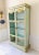 A beautiful vintage c. 1940s Italian Florentine celadon china cabinet, richly hand-decorated with gold-tone painted floral...