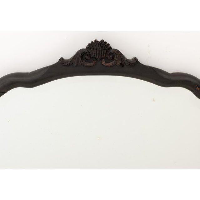 Glass Mirror, with carved shell motif cresting. Overall: 21" H x 28.25" W x 1.5" D. Provenance: From a Connecticut Estate.