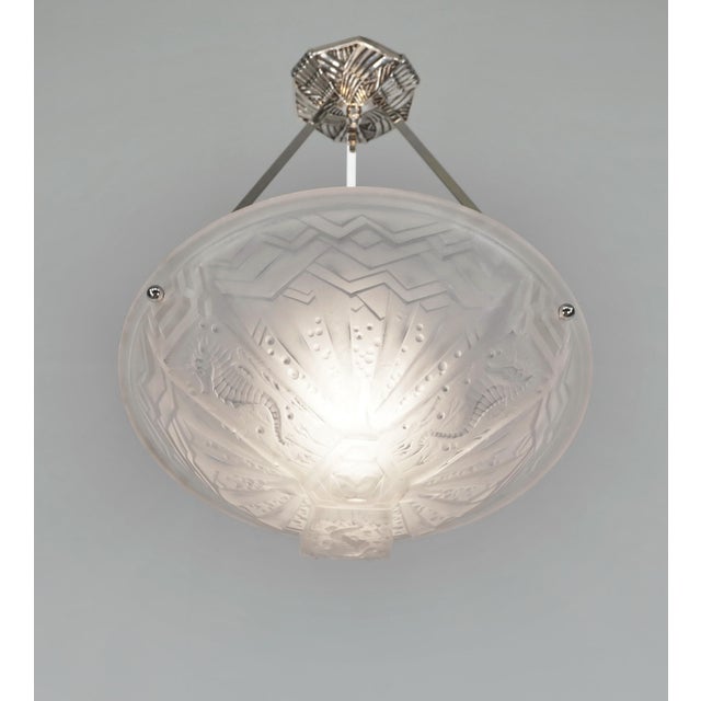 Hettier et Vincent - Muller frères sea horses A rare French art deco pendant light by Hettier & Vincent in nickel plated...
