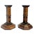 Stunning matched pair of antique Italian marquetry candlesticks. Each has a geometric pattern of alternating wood tiles....