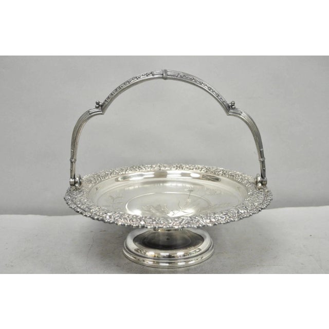Antique Meriden Art Nouveau Silver Plated Floral Repousse Bread Pastry Brides Basket with Flower Engraved Etched Center....