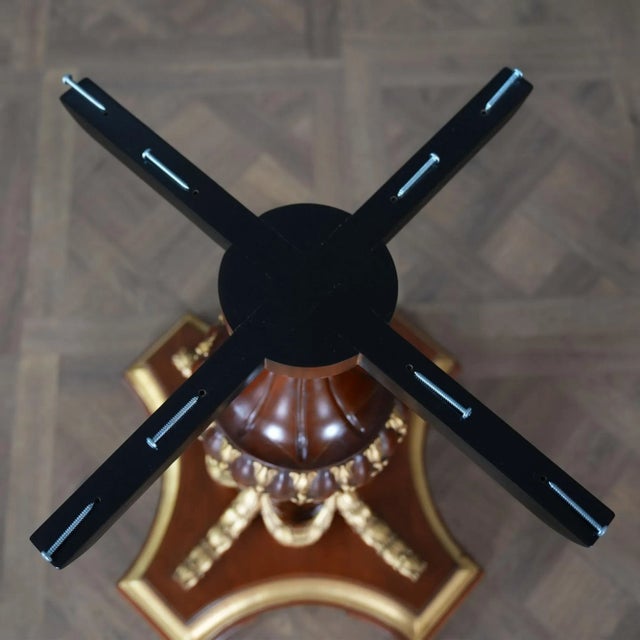 A gorgeous, high quality Burled Center Table from Niagara Furniture with plenty of presence to brighten up any room....