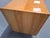 This Mid-Century Modern sideboard was produced in Czechoslovakia during the 1960s. It features a beautifully figured wood...