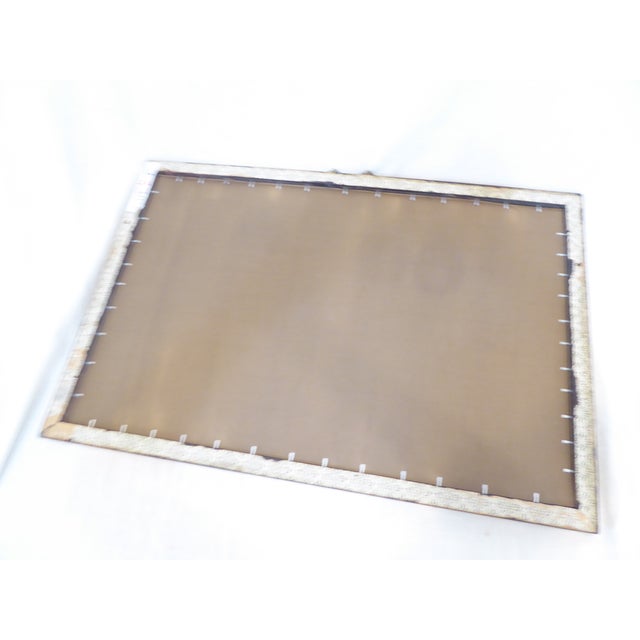 This Chinese Export giltwood mirror has a brass hanger at the top and hangs horizontally. It is 19"H x 28"L and the bronze...