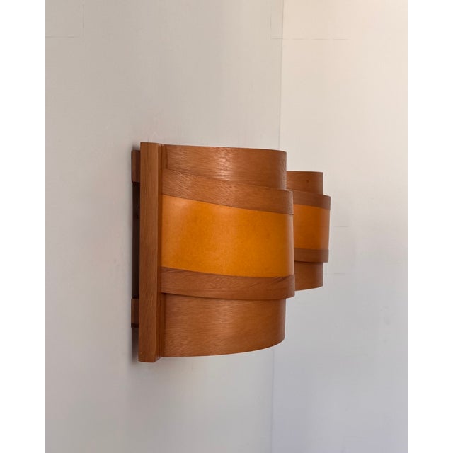 Pair of wall sconces made from pine slats, produced in Sweden in the 1970s. Original design. Beautiful play of light...