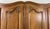 Vintage French Louis XVI Style Carved Oak 4-Door Armoire For Sale - Image 3 of 16