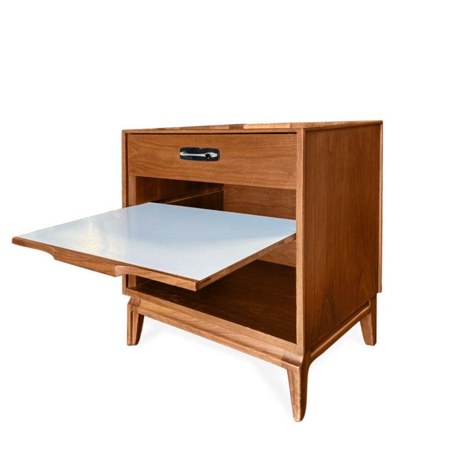These Vintage Red Lion Mid-Century Modern End Tables or Nightstands showcase warm wood tones, clean architectural lines,...