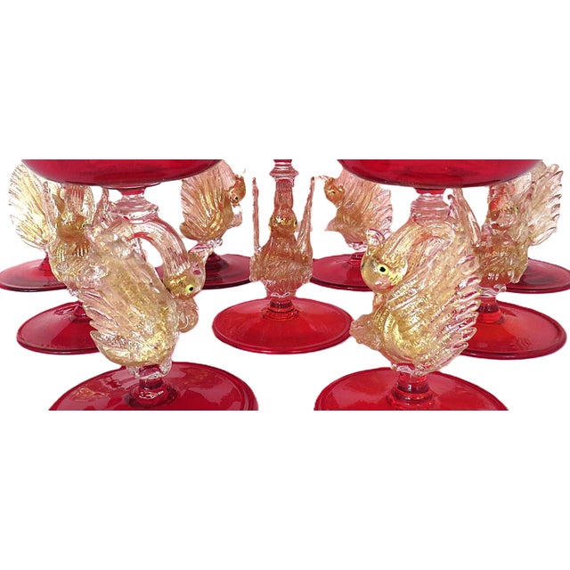 FREE SHIPPING ANYWHERE IN THE CONTINENTAL US! This is a set of Murano glass champagne coupes in ruby red with gold swan...