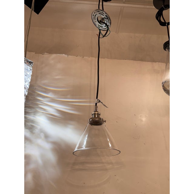 Design Plus Gallery presents a 20th C. Factory Filament Clear Glass Barn Pendant by Restoration Hardware. This RH pendant...