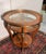 Louis XV style display table in violet wood opens with a circular top encircled by an openwork bronze gallery abundant...