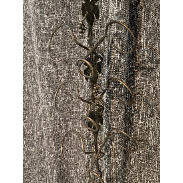 A striking architectural vine design, evoking the feeling of climbing through sunlit grape fields.! A striking and unique...