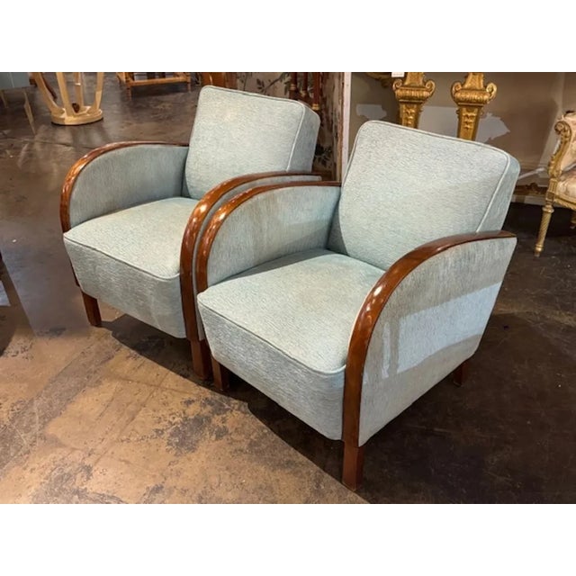 The Pair of French Art Deco Mahogany Club Chairs are elegant and stylish seating options. Crafted from high-quality...