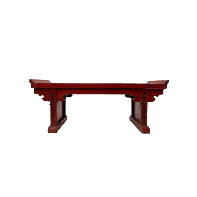 This is a handmade Chinese accent decorative display stand made of wood and finished with the distressed red base color....