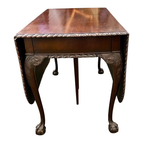 Rare and Large George II Mahogany Drop-Leaf Dining Table, the rectangular top formed of three single-board planks of rich,...